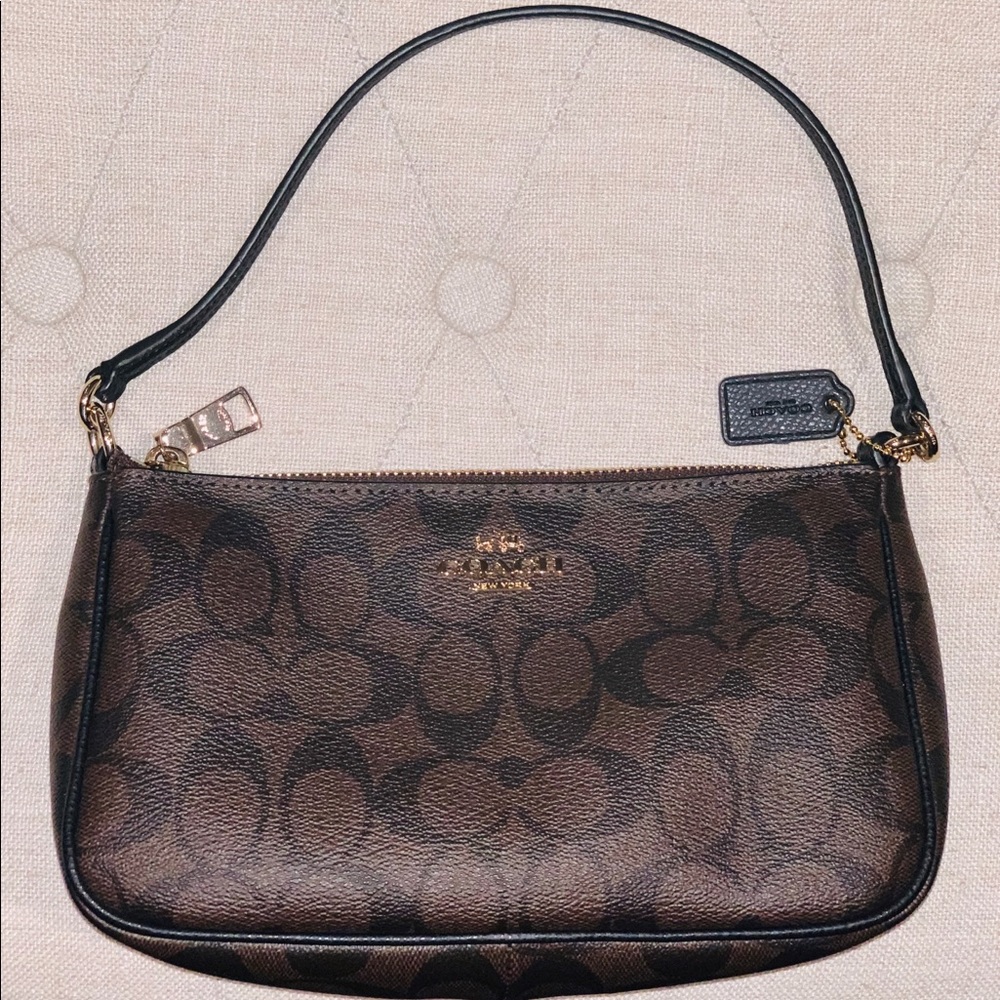 Small brown leather Coach handbag